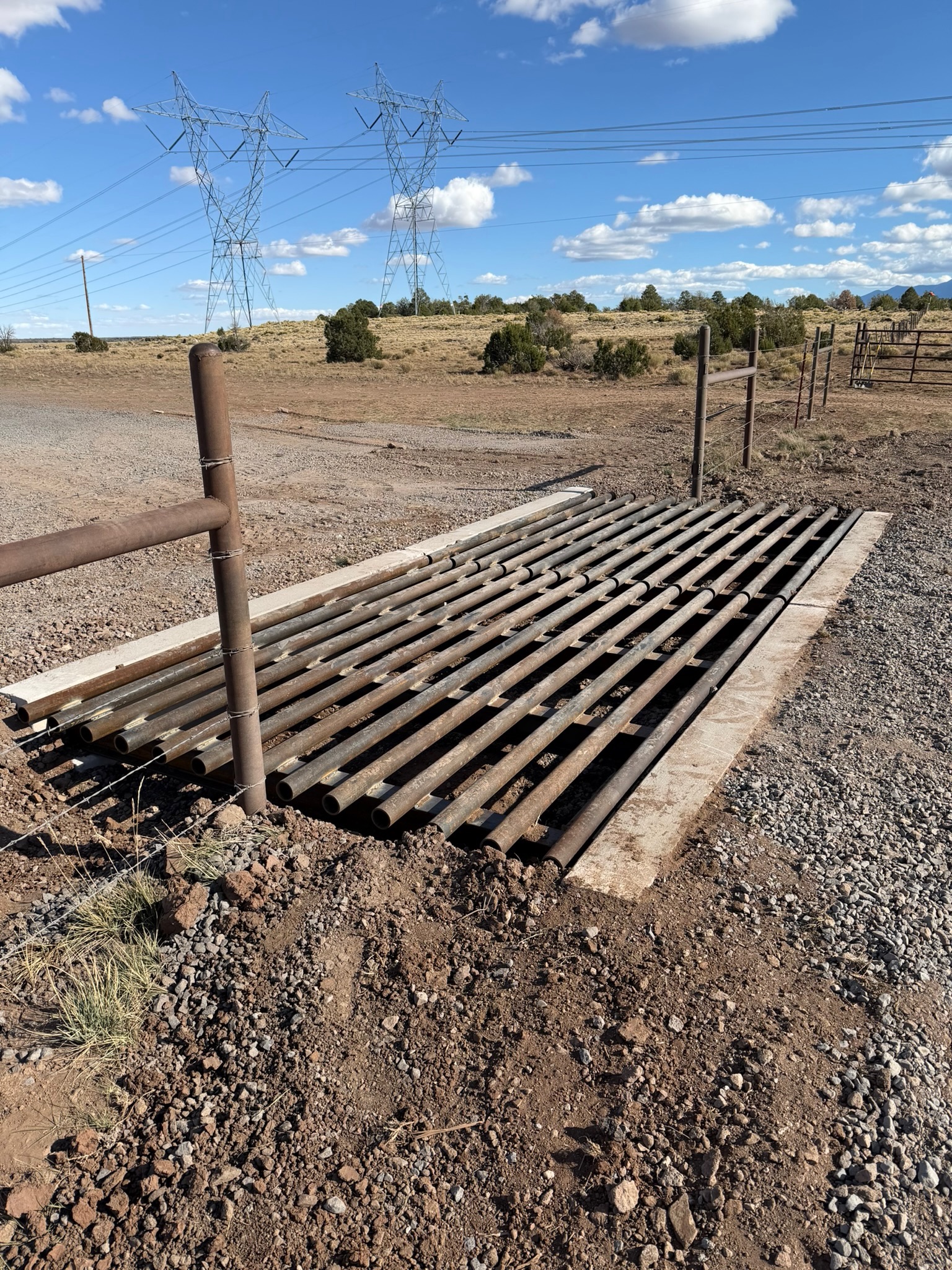 Fabricated cattle guard installed at a ranch road crossing